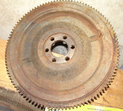 1600 711 flywheel back side with dowell hole witness mark.JPG and 